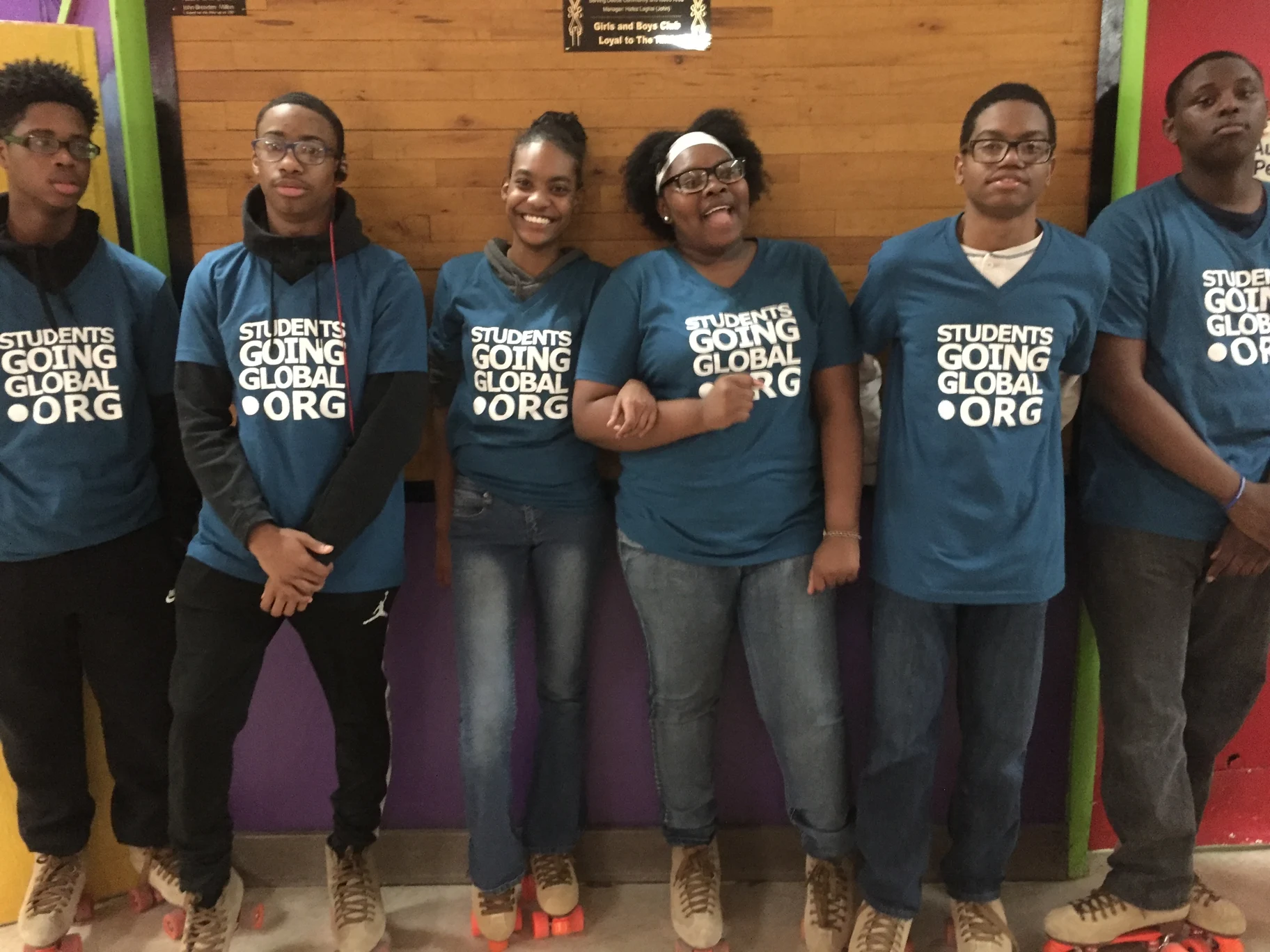 Students Going Global youth gathered together in their program shirts